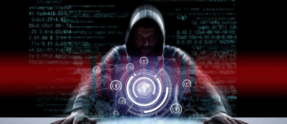 Anonymous internet hacker in front of computer. Web crime concept Stock Photos