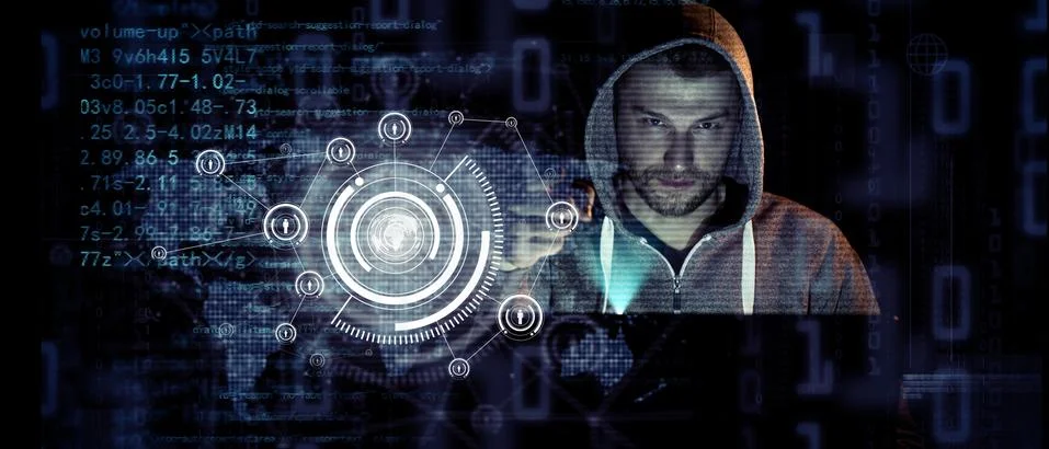 Anonymous internet hacker in front of computer. Web crime concept Stock Photos