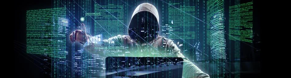 Anonymous internet hacker in front of computer. Web crime concept 写真素材