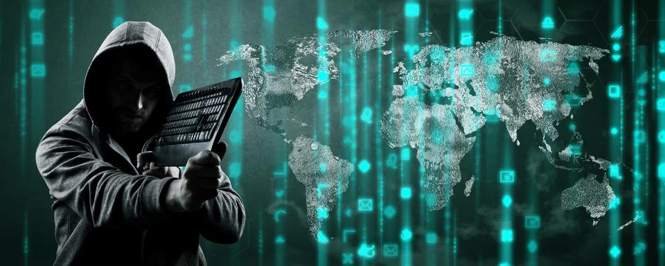 Anonymous internet hacker in front of computer. Web crime concept Stock Photos