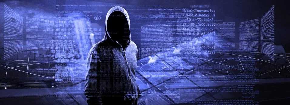 Anonymous internet hacker in front of computer. Web crime concept Stock Photos
