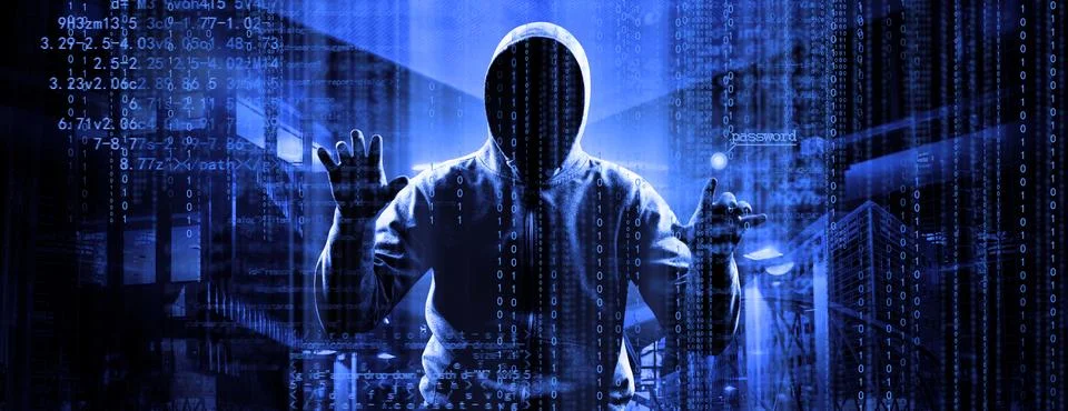 Anonymous internet hacker in front of computer. Web crime concept Stock Photos