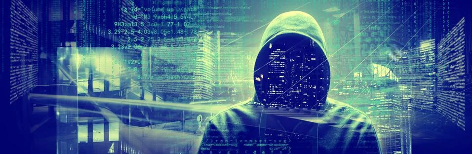 Anonymous internet hacker in front of computer. Web crime concept Stock Photos