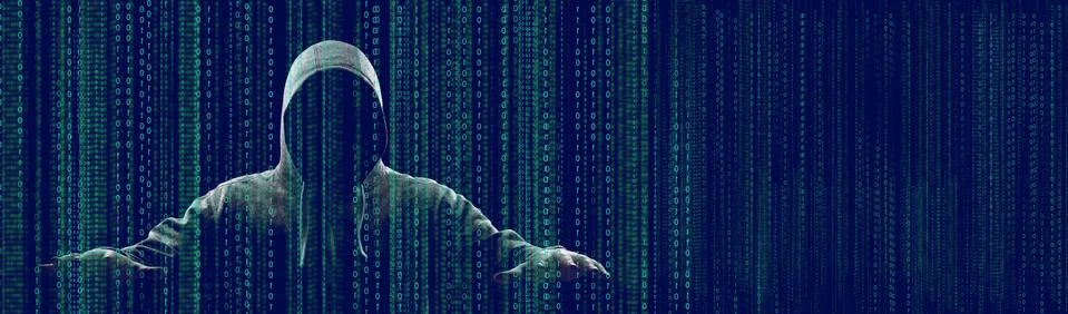 Anonymous internet hacker in front of computer. Web crime concept Stock Photos