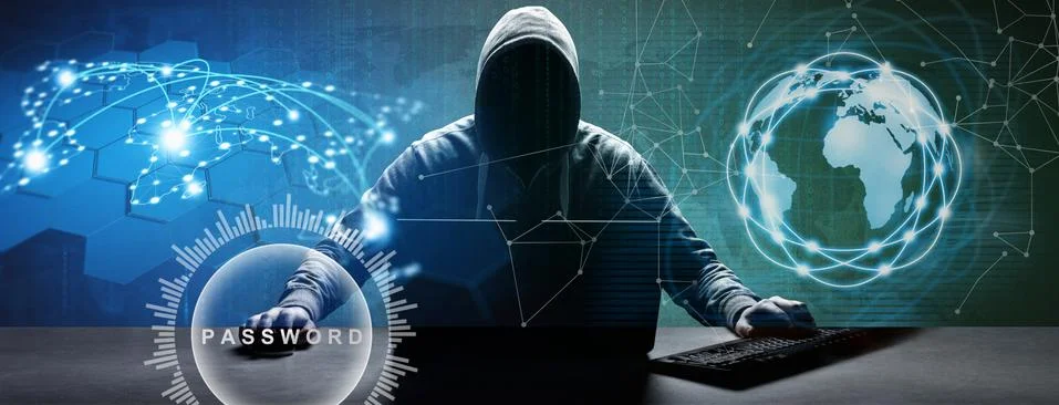 Anonymous internet hacker in front of computer. Web crime concept Stock Photos