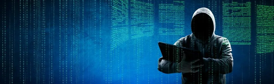 Anonymous internet hacker in front of computer. Web crime concept Stock Photos