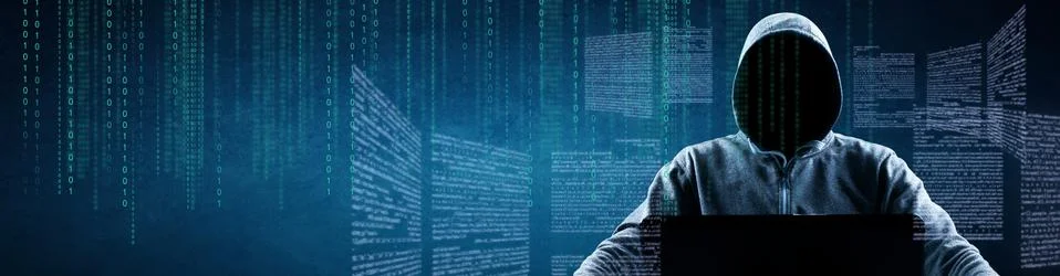 Anonymous internet hacker in front of computer. Web crime concept Stock Photos