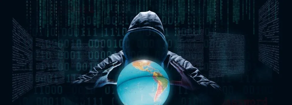 Anonymous internet hacker in front of computer. Web crime concept Stock Photos