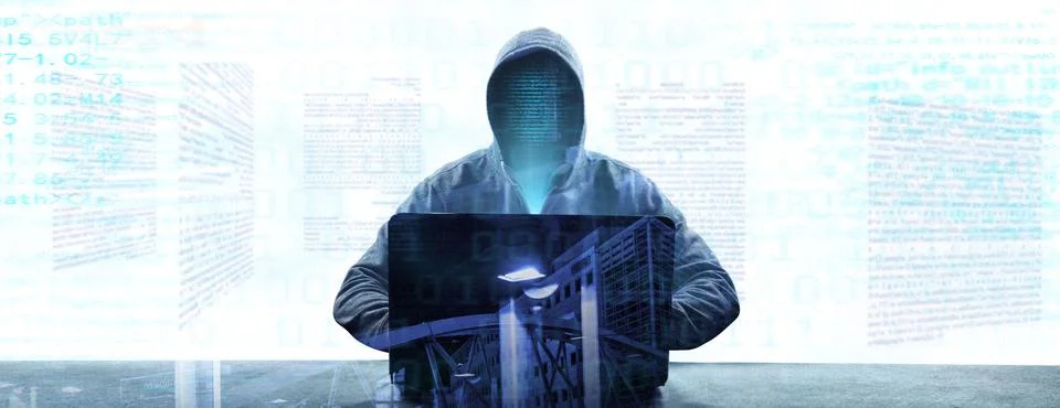 Anonymous internet hacker in front of computer. Web crime concept Stock Photos