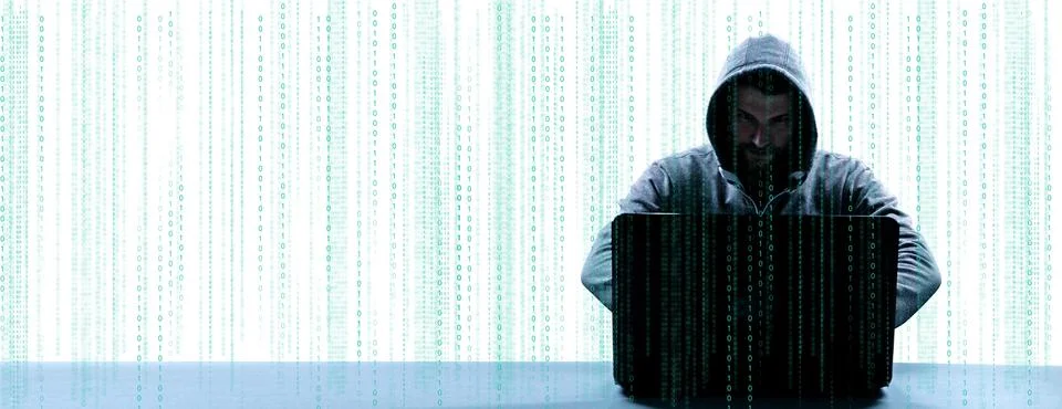 Anonymous internet hacker in front of computer. Web crime concept Stock Photos