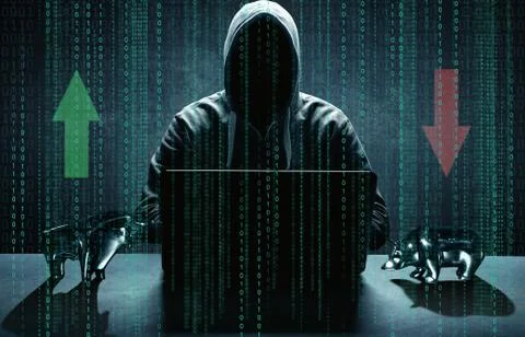 Anonymous internet hacker in front of computer. Web crime concept Stock Photos