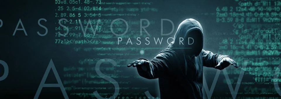 Anonymous internet hacker in front of computer. Web crime concept Stock Photos
