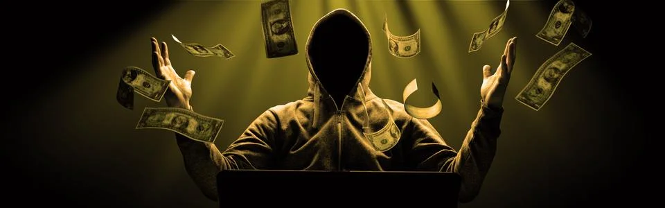 Anonymous internet hacker in front of computer. Web crime concept Stock Photos