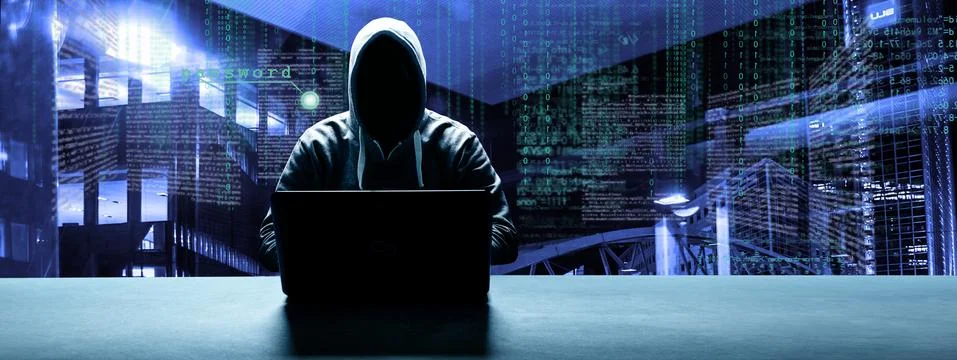 Anonymous internet hacker in front of computer. Web crime concept 写真素材