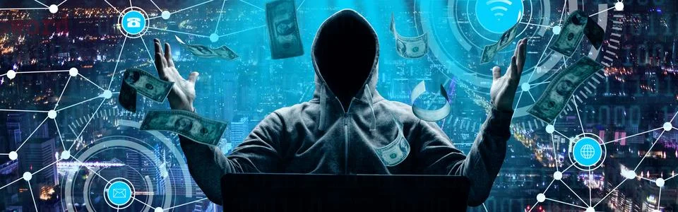 Anonymous internet hacker in front of computer. Web crime concept Stock Photos
