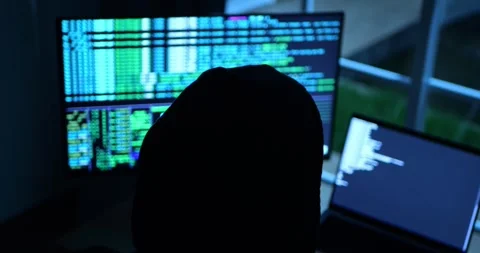 Anonymous Male Hacker Breaks into Data Servers, DDOS Attack, Phishing Attack. 库存影片 279868028