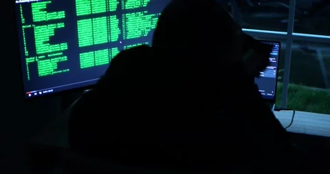 Anonymous Male Hacker Breaks into Data Servers, DDOS Attack, Phishing Attack. 库存影片 279868790