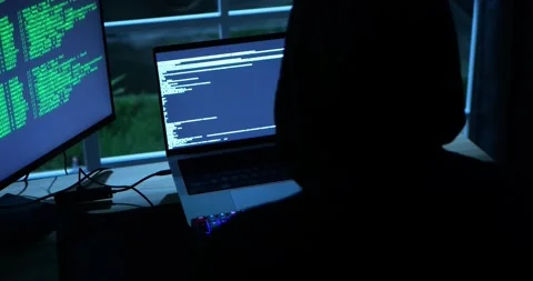 Anonymous Male Hacker Breaks into Data Servers, DDOS Attack, Phishing Attack. 库存影片 279869140