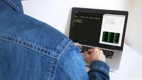 Anonymous Man Coding Network In Laptop, Zoom In Stock Footage 82027285