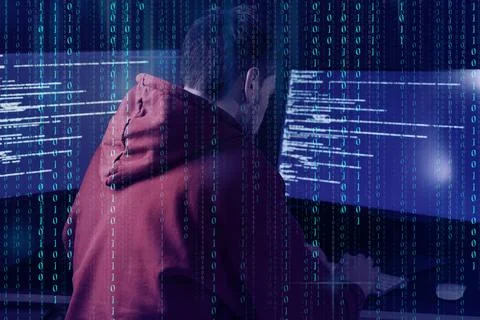 Anonymous man with computers and binary code Stock Photos