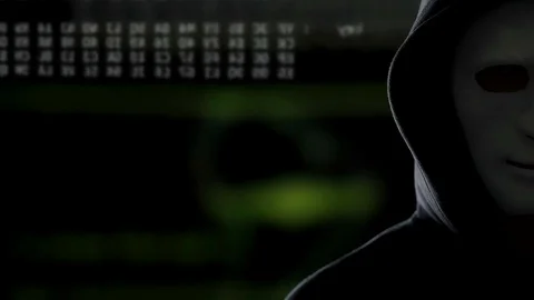 Anonymous man cracking server system, worldwide cyber terrorism problem Stock Footage 85171657