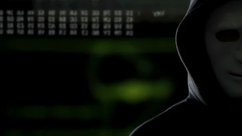 Anonymous man cracking server system, worldwide cyber terrorism problem Stock Footage 85175617