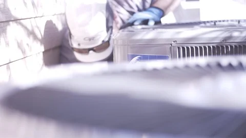 Anonymous Man Installing Air Conditioning Unit Stock Footage 88013622