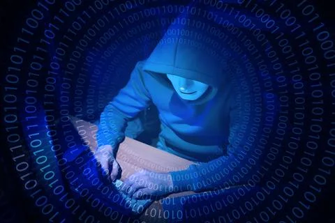 Anonymous man in mask with computer and binary code in darkness 스톡 사진