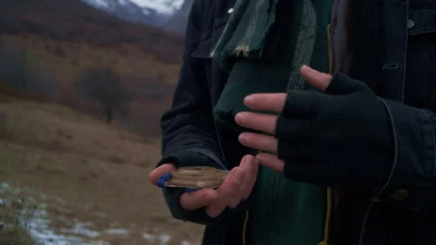 Anonymous Man Navigating in Mountains with Vintage Compass, Close-Up 库存影片 302219959