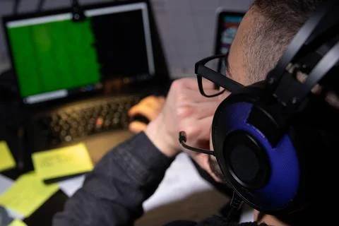 Anonymous man planning hacker attack Stock Photos