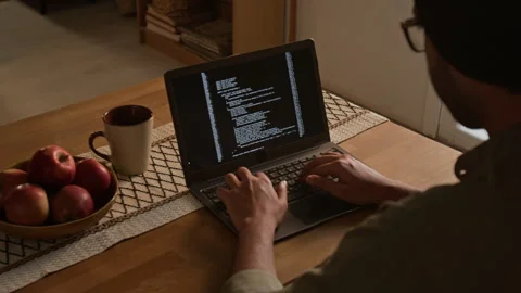 Anonymous Man Typing Machine Code on Laptop Working from Home 스톡 동영상 295148283