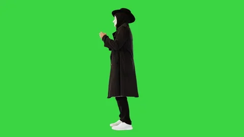 Anonymous man in white mask, hacker activist talking, performing manipulating Stock Footage 193986779