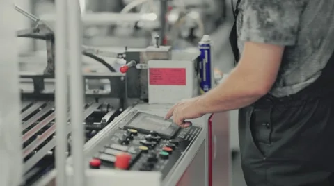 Anonymous man working at the factory Stock Footage 65877836