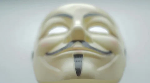Anonymous mask with smooth pan Stock Footage 34689519