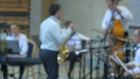 Anonymous Men playing on the stage during jazz concert. 4k Video stock 77569270