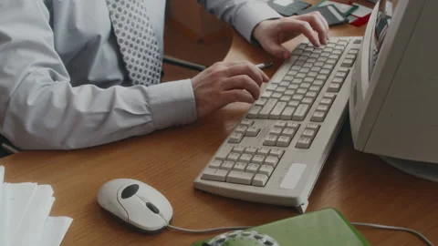 Anonymous Office Worker Working on Computer with Keyboard and Wired Mouse Stock Footage 280260381