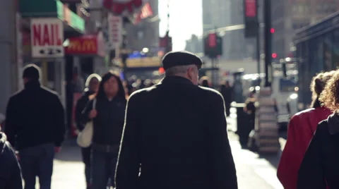 Anonymous old man Walking sidewalk in New York City Slow Motion Stock Footage 40419943