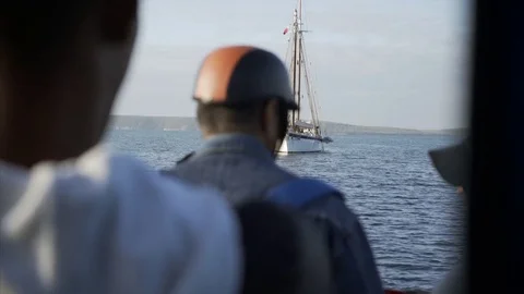 Anonymous passengers on the boat Stock Footage 76007638