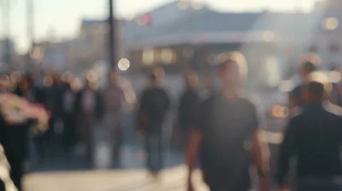 Anonymous people out of focus are walking Stock Footage 66699208