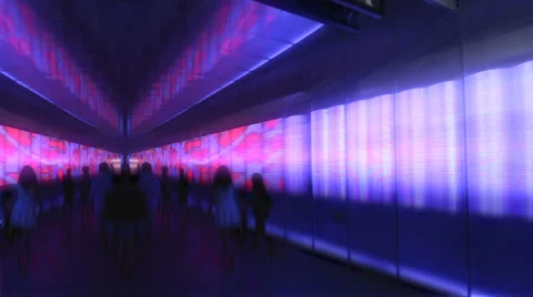 Anonymous people walking through light tunnel 02 Stock Footage 32241965