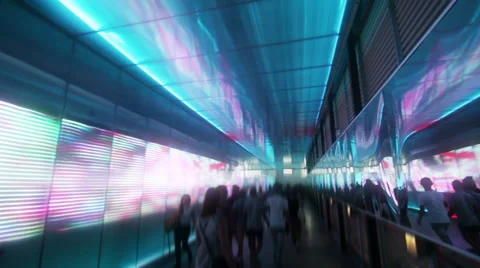 Anonymous people walking through light tunnel 01 Stock-Footage 32242231