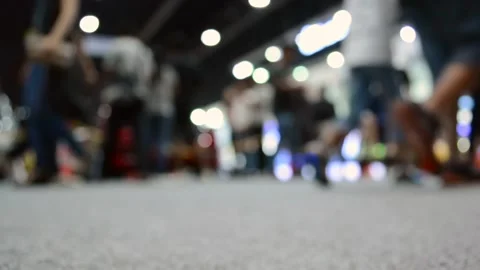 Anonymous people walking while someone travel by wheelchair. Stock Footage 150561450