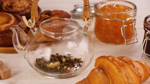 Anonymous person preparing tea for breakfast Video stock 136673723
