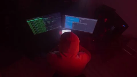 Anonymous person works on the computer, inputs code, programming, hacking Stock Footage 147670410