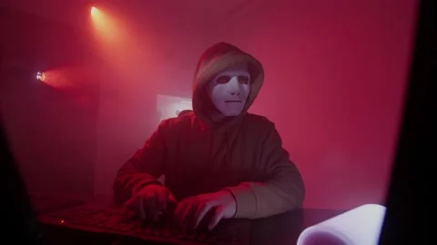 Anonymous person works on the computer, inputs code, programming, hacking Stock Footage 147670526