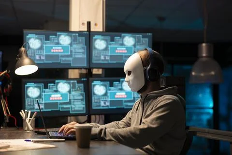 Anonymous programmer hacking and retrieving encrypted data Stock-Fotos