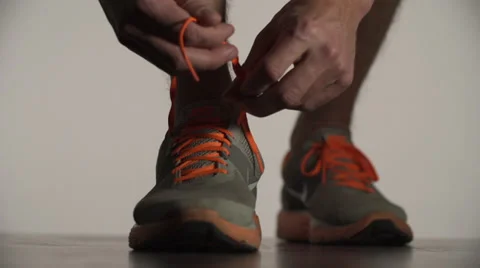 Anonymous runner shoelace Stock Footage 39561050