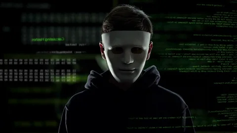 Anonymous scary hacker taking off mask, IT criminal disclosure, confession Video stock 83019241