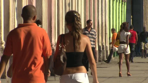Anonymous shoppers, colourful old shops Stock Footage 40235648