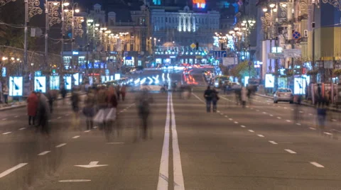The anonymous smashed people crowd stream on the road. Night time. Time lapse  Stock Footage 68978853